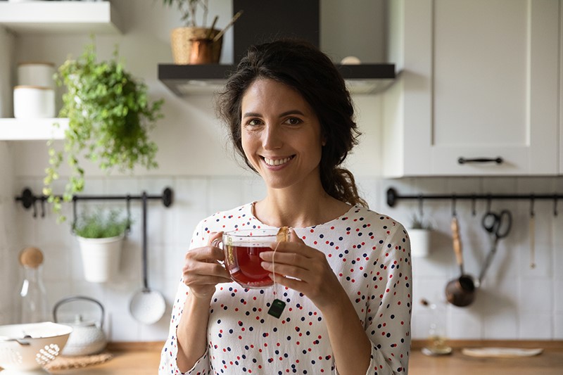 2A woman drinking Soursop Leaf tea 2A woman drinking Soursop Leaf tea